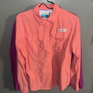 Magellan Outdoor. Two, one price. Fishing shirts. One coral, one plum.